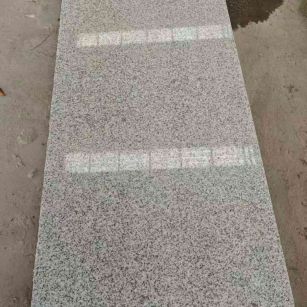 安康芝麻白光面毛板