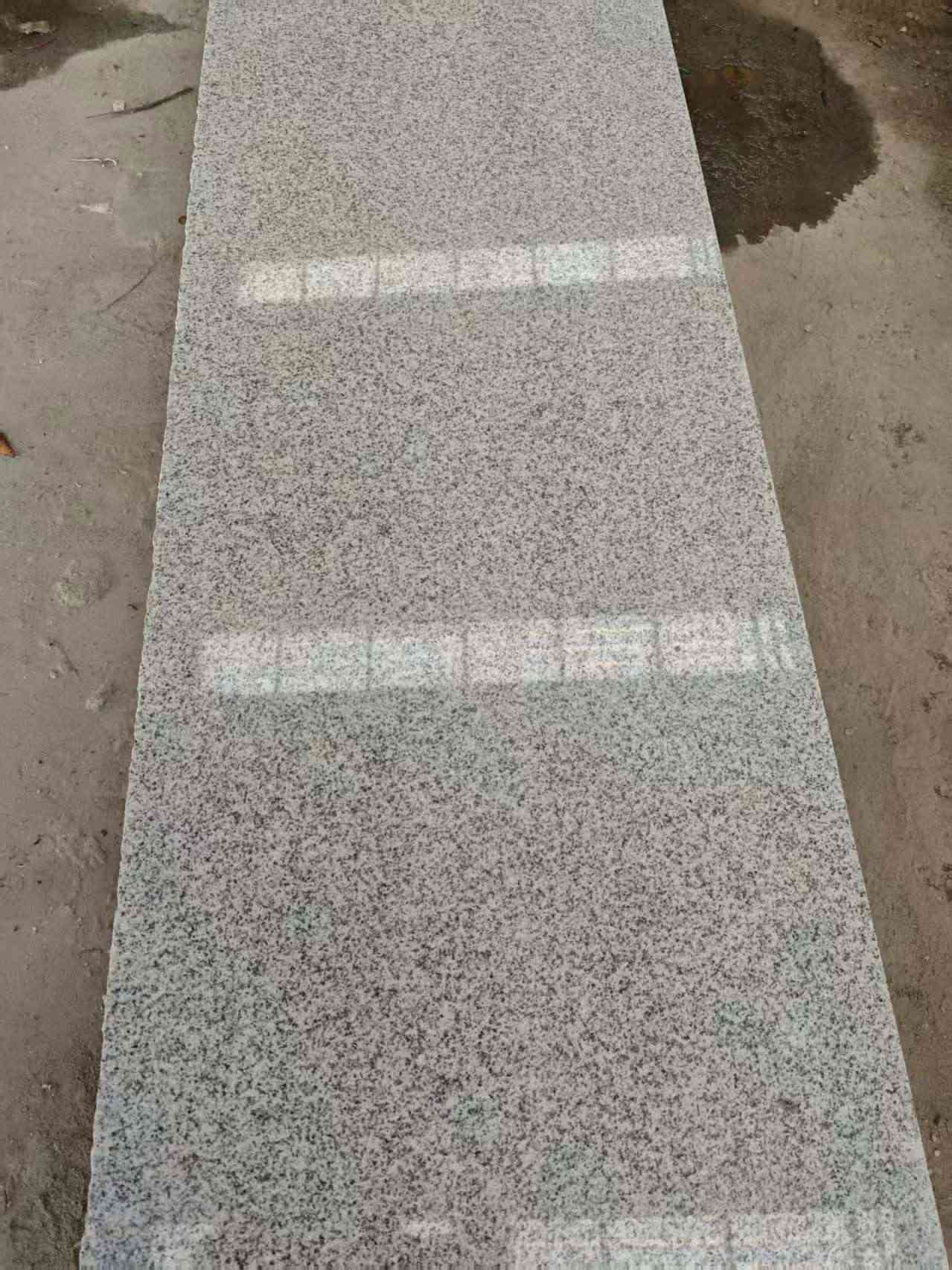 安康芝麻白光面毛板